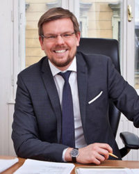 RA Mag. Damian Brzezinski